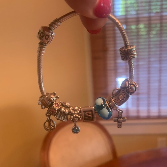 Pandora Silver Charm Bracelet with Blue Accent 9 retired charms and one clip